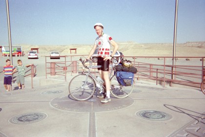 Alan straddling his bike in four states at one time