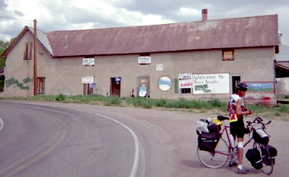Building at intrance to Tierra Amarilla with graffitti