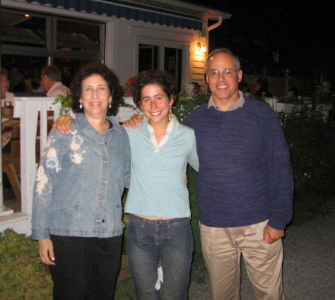 Maddy and parents in front of the Anaco Inn
