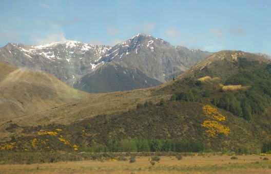 Field and mountains, seen from the train