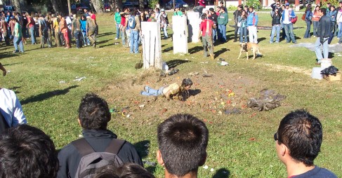 Student diving into mud puddle