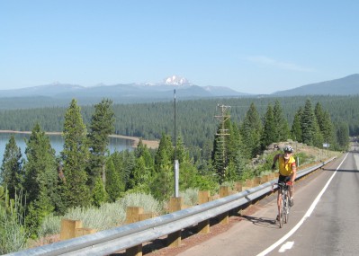 Gary climbing a hill with Mount Lassen in the distance