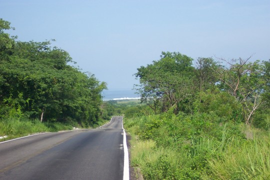 Road with ocean in the distance