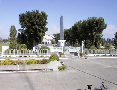 Town square with obelisk and gardens