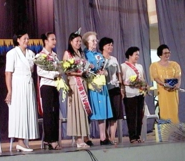 The contestants standing with their corsages